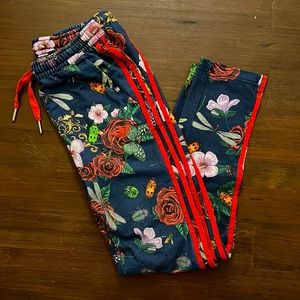 Adidas three stripe joggers sweatpants with roses and bugs in blue and red